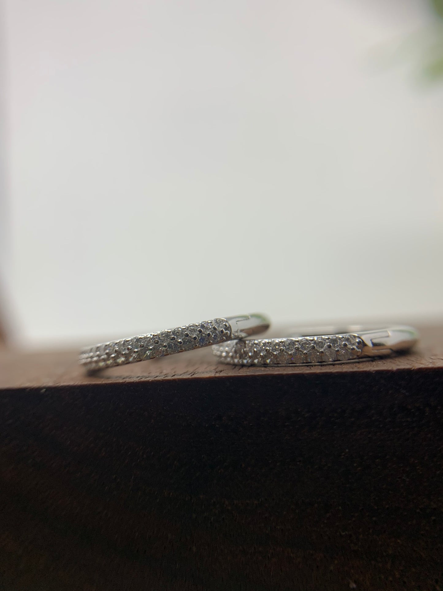 Made from sterling silver with rhodium plated to prevent tarnishing. They are beautifully designed with 34 round cubic zirconia in a prong setting.
