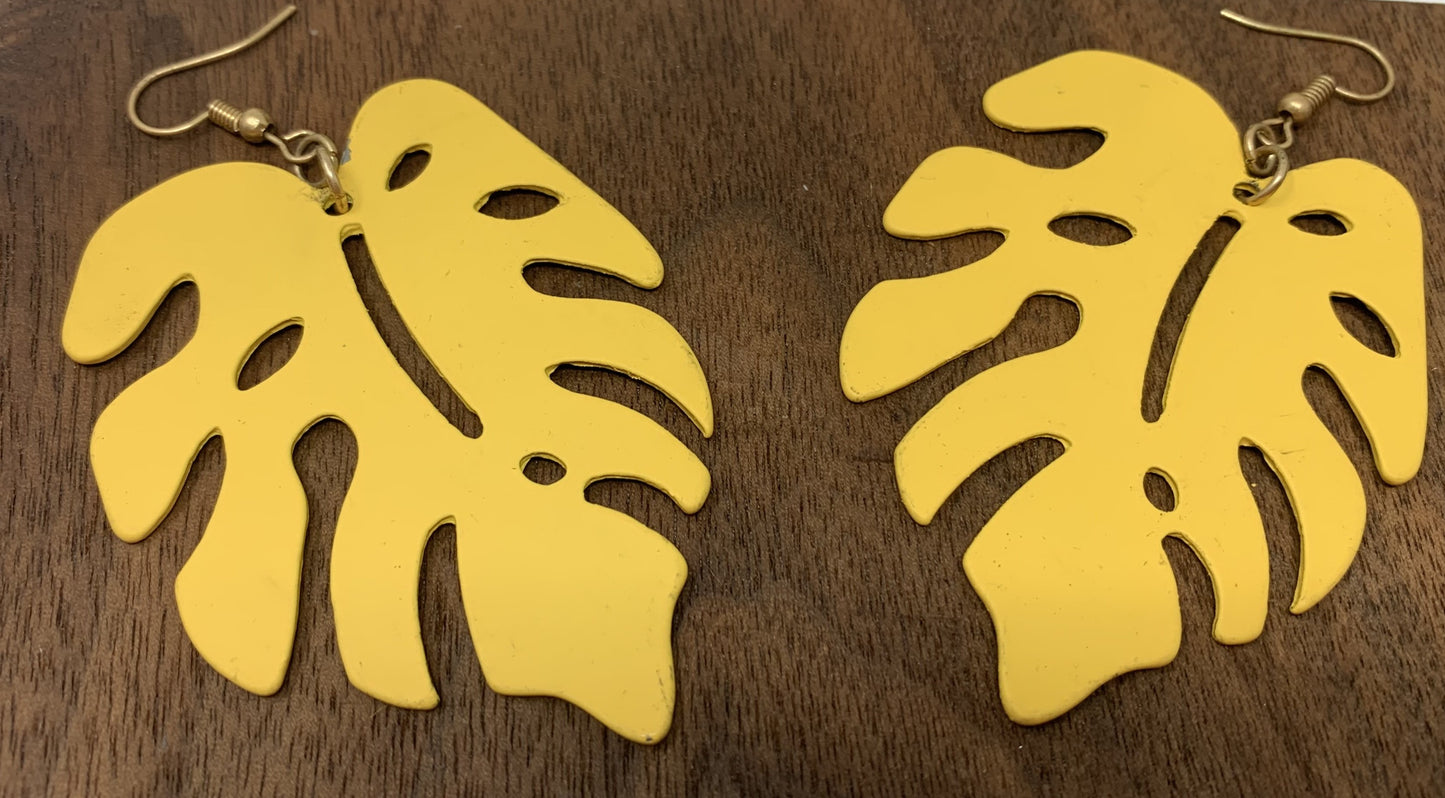 Tropical leaf hook earrings, metal and weigh 1oz each. They are not light weight.