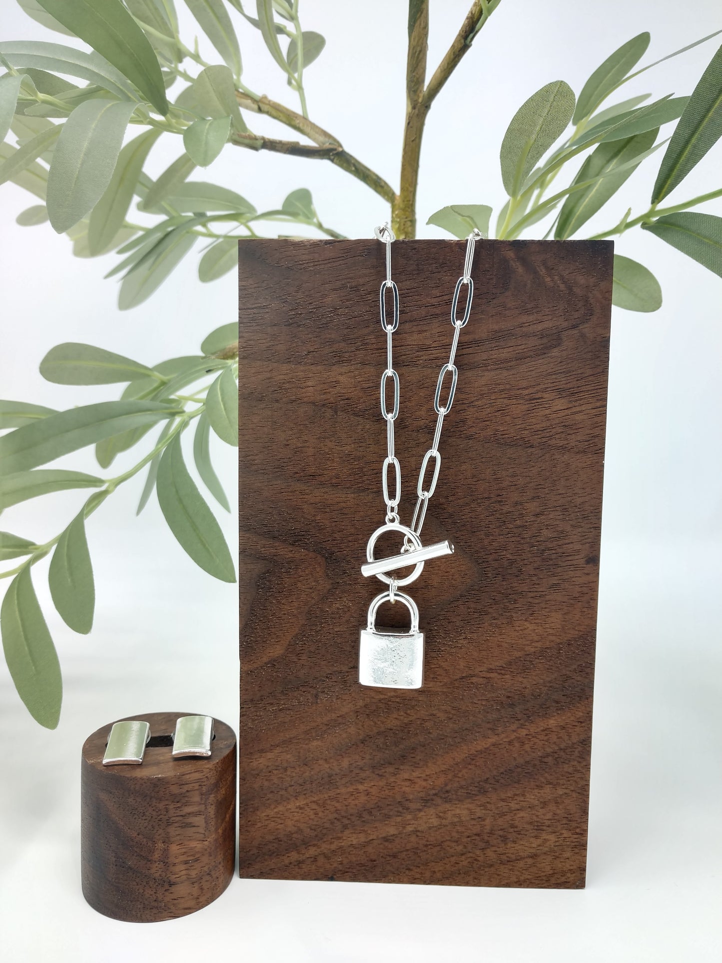 Can be layered for a unique look or worn alone. Great gift ideas for teens or for yourself! This linked chain necklace measures approximately 15.5", with a padlock pendant measuring up to 1" with a toggle closure. Limited Quantity